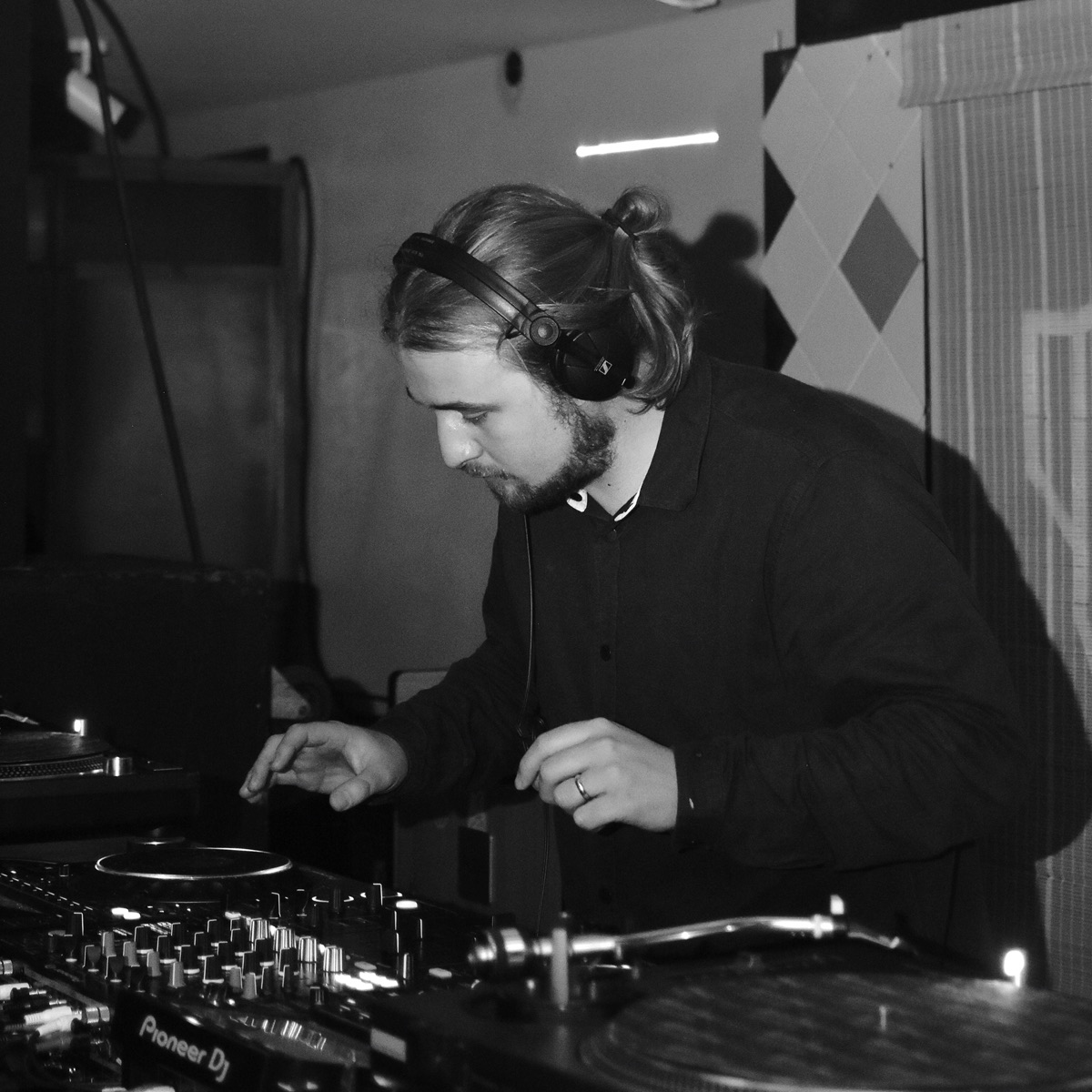 Ev, founder of Chester Wedding DJs, DJing on Pioneer decks